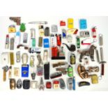 Collection of novelty cigarette lighters including a liner, Honda motorbike, mobile phone,