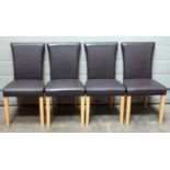 Set of 4 contemporary dining chairs, each with a dark brown leather upholstered back and seat, on