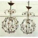 Pair of gilt lacquered spherical ceiling lights with faceted glass floral decoration, H 38cm (2)