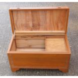 Oriental teak chest with carved bands, hinged top and camphorwood lined interior with sliding