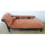 Edwardian chaise longue with a pierced back, on tapering legs, upholstered in buttoned pink