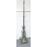 Chromed metal standard lamp with a reeded and adjustable column, scroll and floral decoration, on