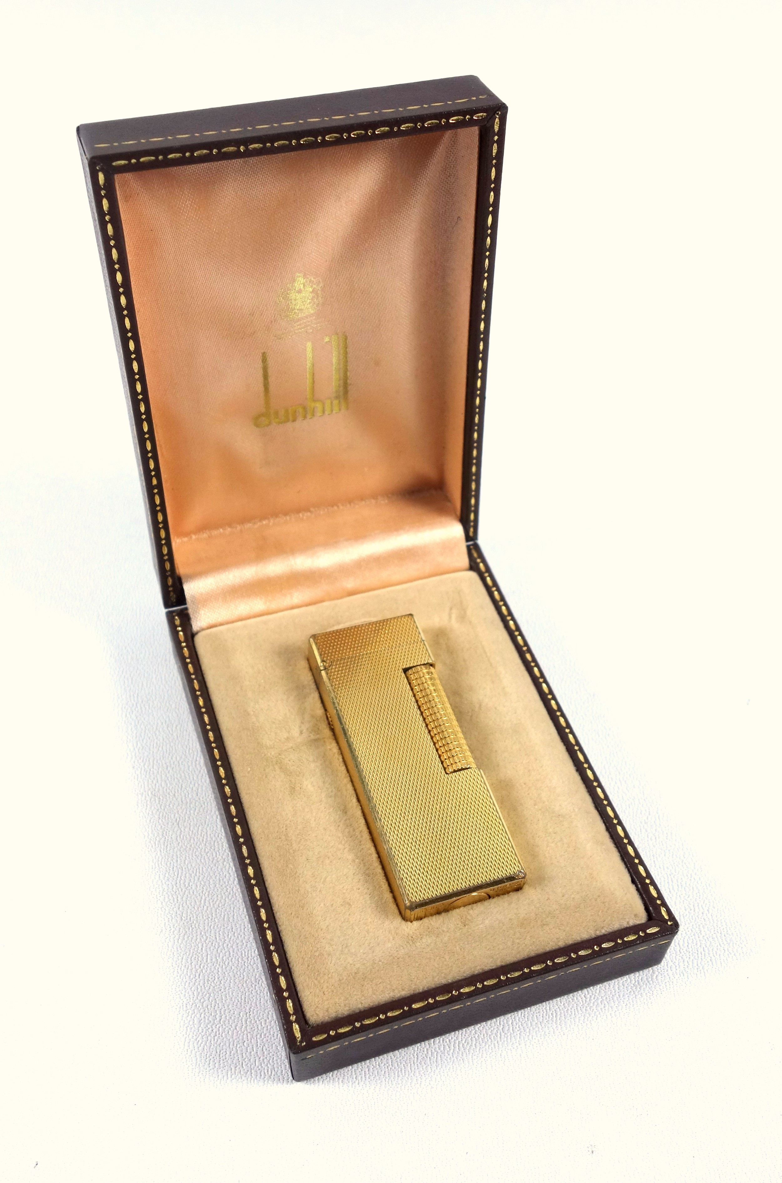 A gold Plated Dunhill lighter in original fitted case, together with an Omega wrist watch and a felt - Bild 4 aus 11