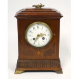 Edwardian mahogany, boxwood line inlaid mantel clock, the circular painted dial with Arabic
