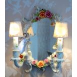 Dresden porcelain girandole with a shaped plate, and a figure and floral encrusted frame with 2