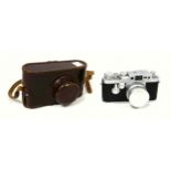 An Ernest Leitz Wetzlar Leica III camera body, serial No. 878902, with Leitz Summaron f 3.5 lens