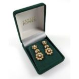 Pair of yellow metal floral pendant earrings set half pearls, marked 375, gross 7.3 grs, cased (3)