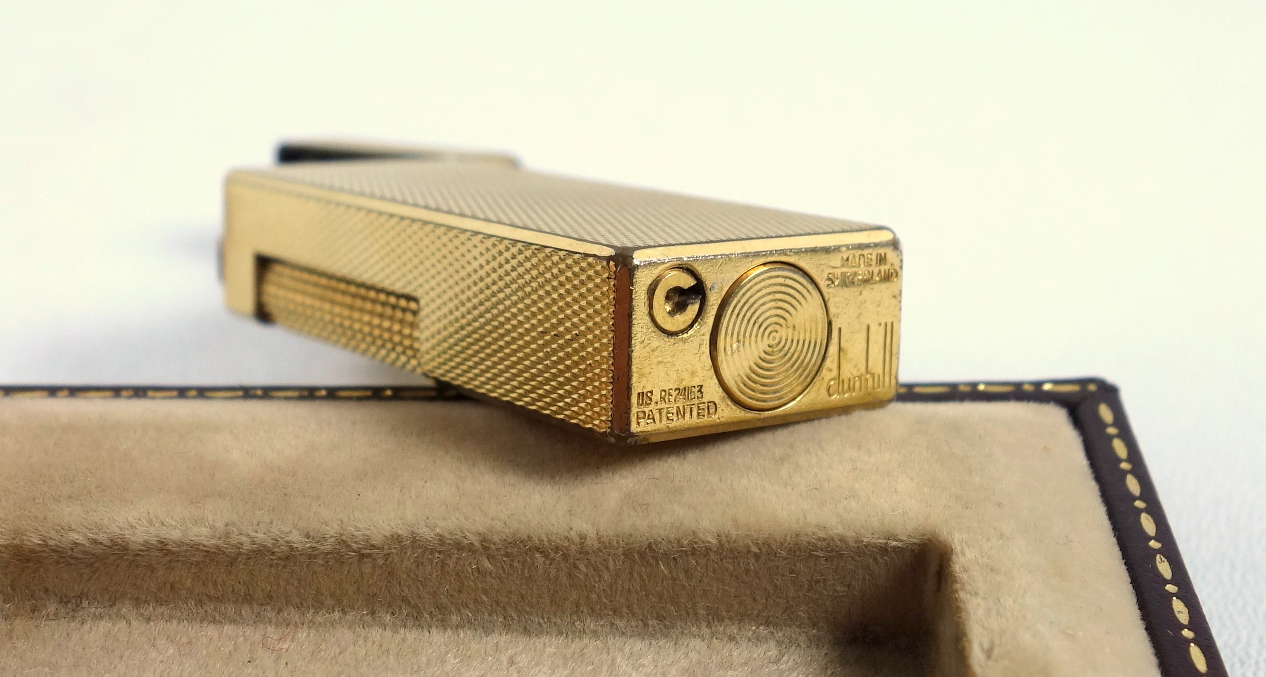 A gold Plated Dunhill lighter in original fitted case, together with an Omega wrist watch and a felt - Bild 6 aus 11