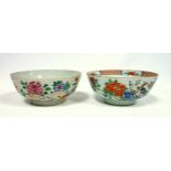 Chinese Qianlong porcelain circular bowl painted in famille rose enamels with a peony within a