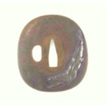 Japanese Edo period sentoku ishime Tsuba of kaku gata (rounded-square) form, decorated in relief