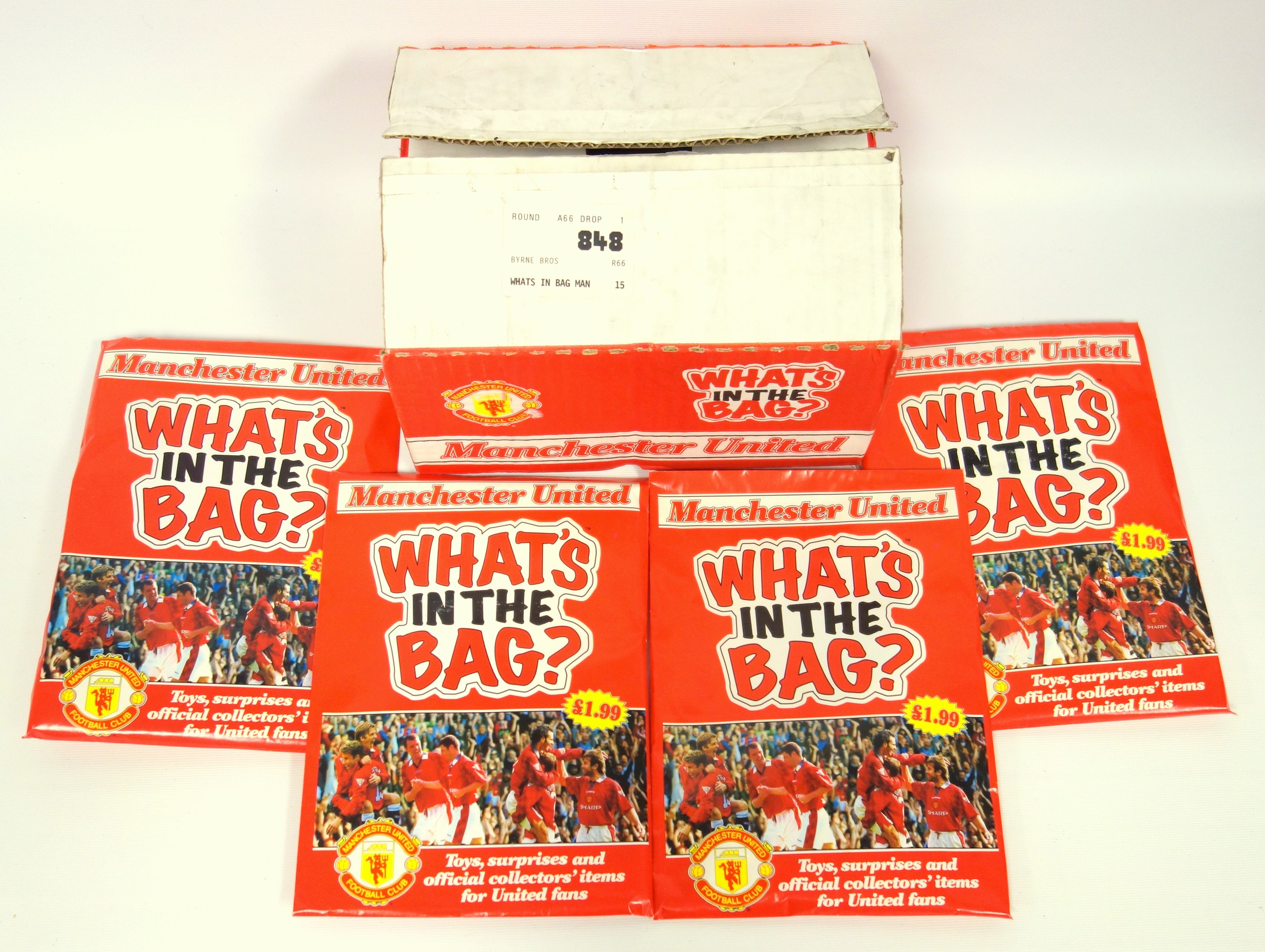 Four rare unopened Manchester United Football Club 'WHAT'S IN THE BAG?' Toys, surprises and official