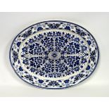 A TC&FB Indian Ornament earthenware meat plate, 46.5 cm wide