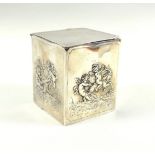 Edwardian silver square section tea caddy, the sides embossed with cherubs in various pursuits, with