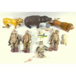 A box of vintage painted wooden toys to include a three articulated African animals (Hippo, Lion and