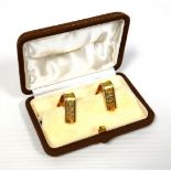 Pair of Continental yellow and white metal cufflinks, inscribed ?SOT?, stamped 750, 19.5grs,