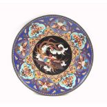 Japanese cloisonné saucerdish with an exotic bird amongst clouds on a black ground within a zigzag