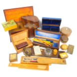 A mixed lot of treen, mostly to include boxes, pencil cases, etc together with a desk top stationery