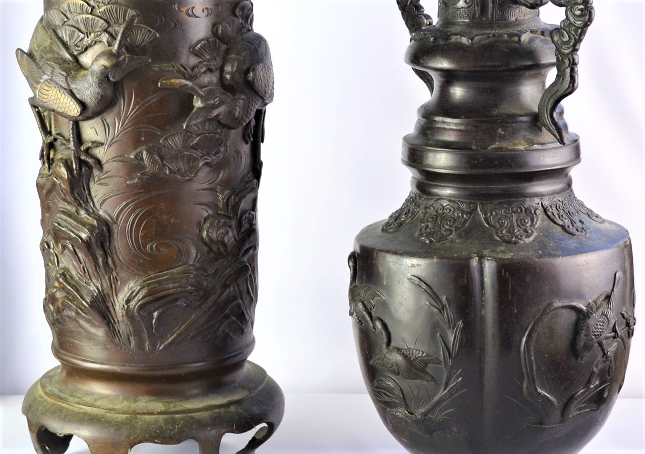 Japanese Meiji period bronze twin handled vase, with relief decoration of birds in trees, 37 cm