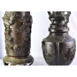 Japanese Meiji period bronze twin handled vase, with relief decoration of birds in trees, 37 cm