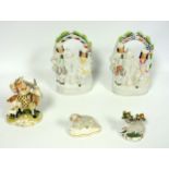 Victorian Staffordshire earthenware group Welsh Tailor?s Wife ? woman with 2 babies riding on a