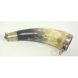 A Continental white metal mounted drinking horn, possibly German, bearing marks, 23 cm long