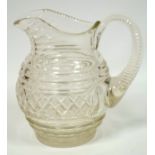 A Regency style cut glass water jug, circa 1900, of typical form with hobnail cut decoration, 19cm