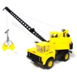 A Mighty Tonka toy crane, a Bandai battery operated vertical crane, boxed, 6 smaller die cast