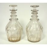 Pair of Georgian triple ring cut glass decanters of Prussian form with octagonal cut stoppers H.