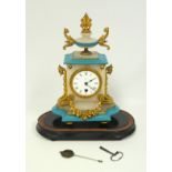 A Sevres style alabaster and gilt metal mounted mantle clock, the enamel dial with single wind