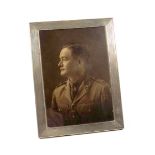 White metal engine turned rectangular photograph frame stamped Sterling, 925, F, 18 x 13.5cm