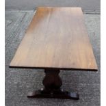 Elm refectory table on shaped end supports and stretcher, 74 x 188.5 x 95cm