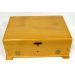 Light oak canteen case with a hinged top and drawer below, 21.5 x 54.3 x 38.5cm overall