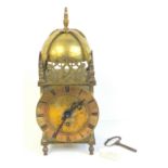 17th century style brass lantern clock, the domed bell over a dial with single wind hole to a