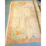 Nepalese carpet, by Kangri, the pink field with floral spandrels and a darker border 480 cm x 300 cm