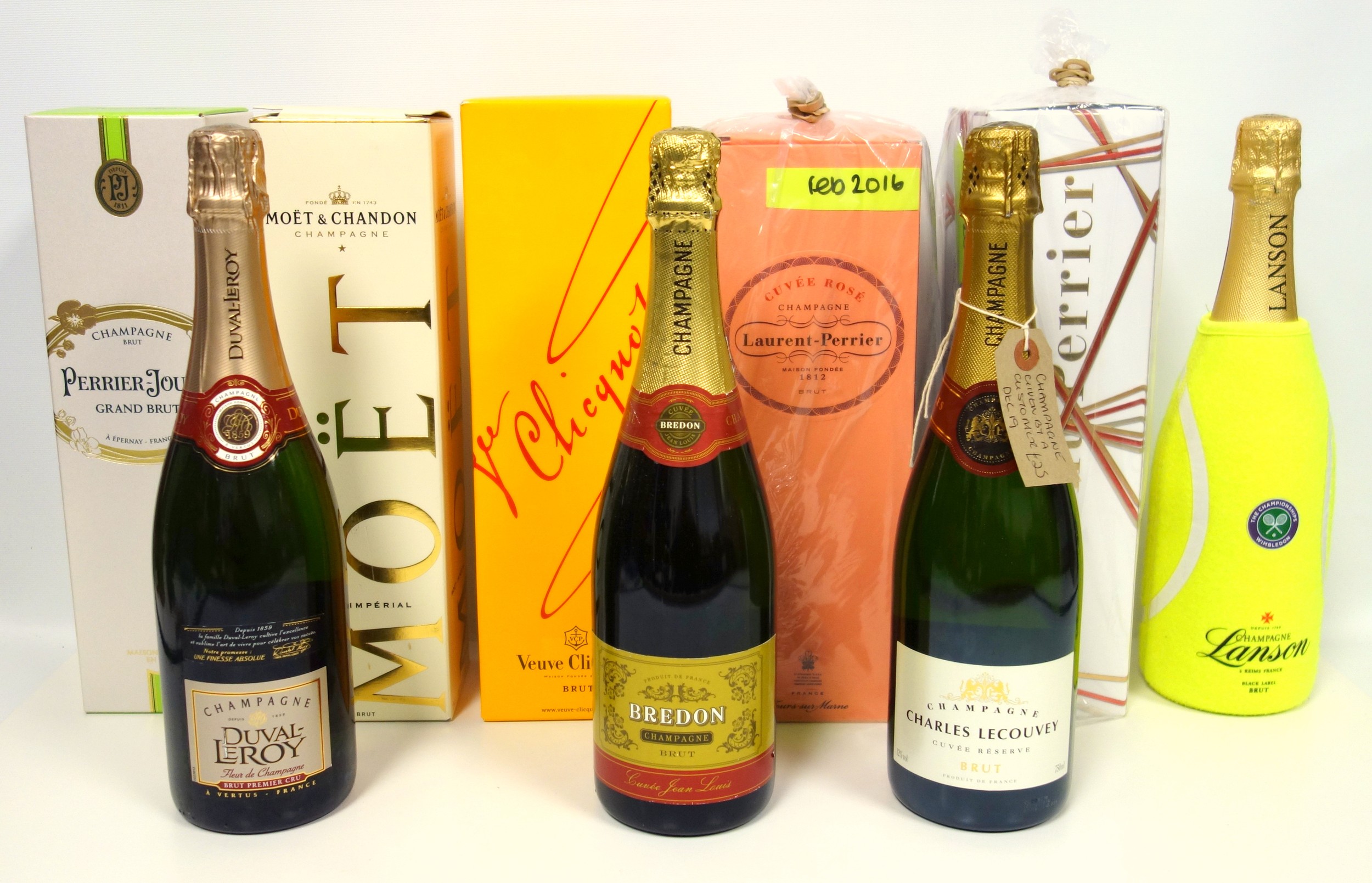 Five bottles of Brut Champagne to include Laurent Perrier, Moet & Chandon, Veuve Cliquot, Perrier -