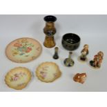 A mixed lot include Two Hummel figures, a Royal Doulton vase and bowl, two miniature Royal Doulton