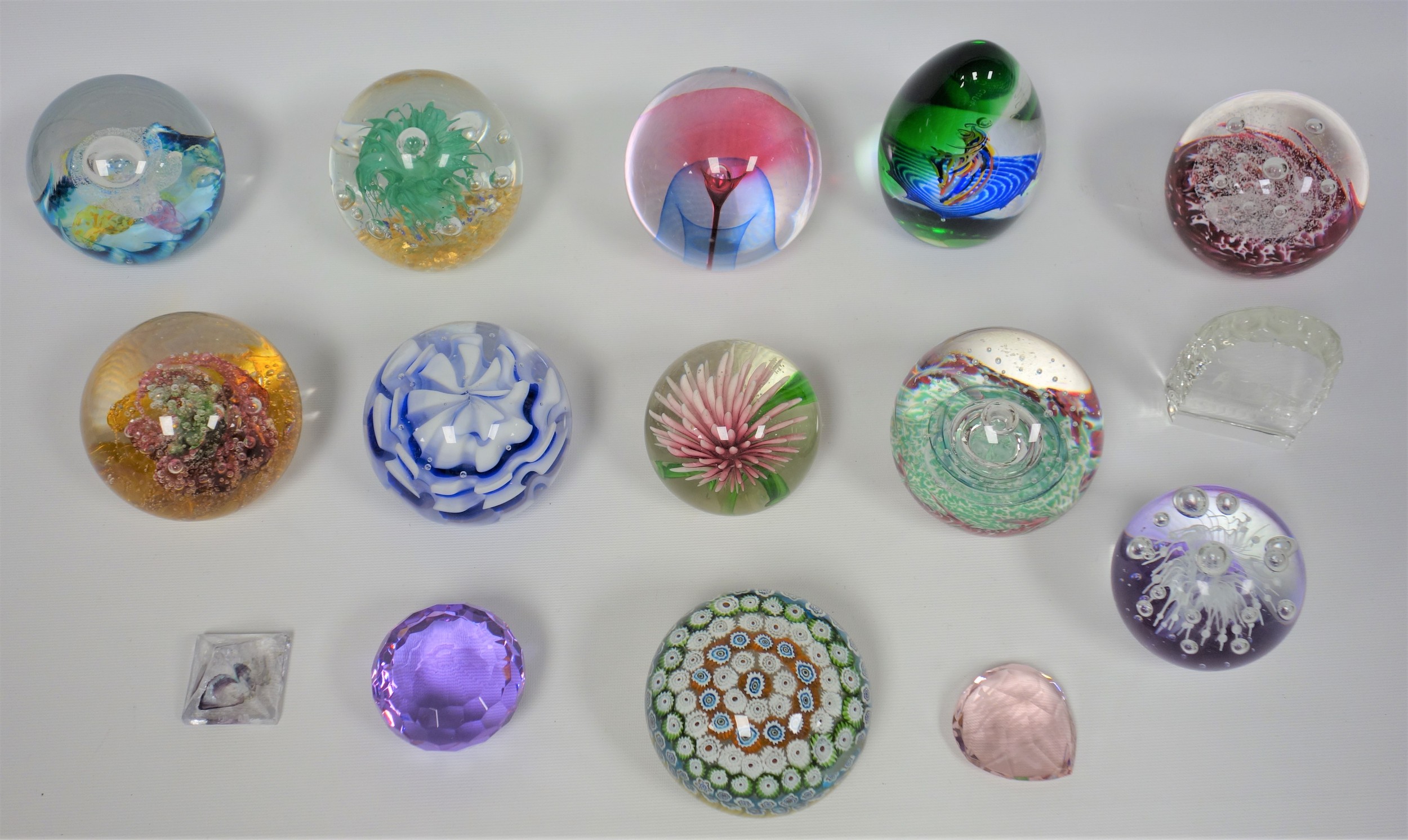 Collection of glass paperweights including millefiore, Selkirk (5), Caithness (2) and Wedgwood (29