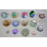 Collection of glass paperweights including millefiore, Selkirk (5), Caithness (2) and Wedgwood (29