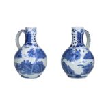 A pair of blue and white porcelain jugs with handle, decorated with figures on the waterfront.