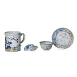 Lot of four blue and white porcelain items, 1) a cup with saucer, decorated with a deer and reserves