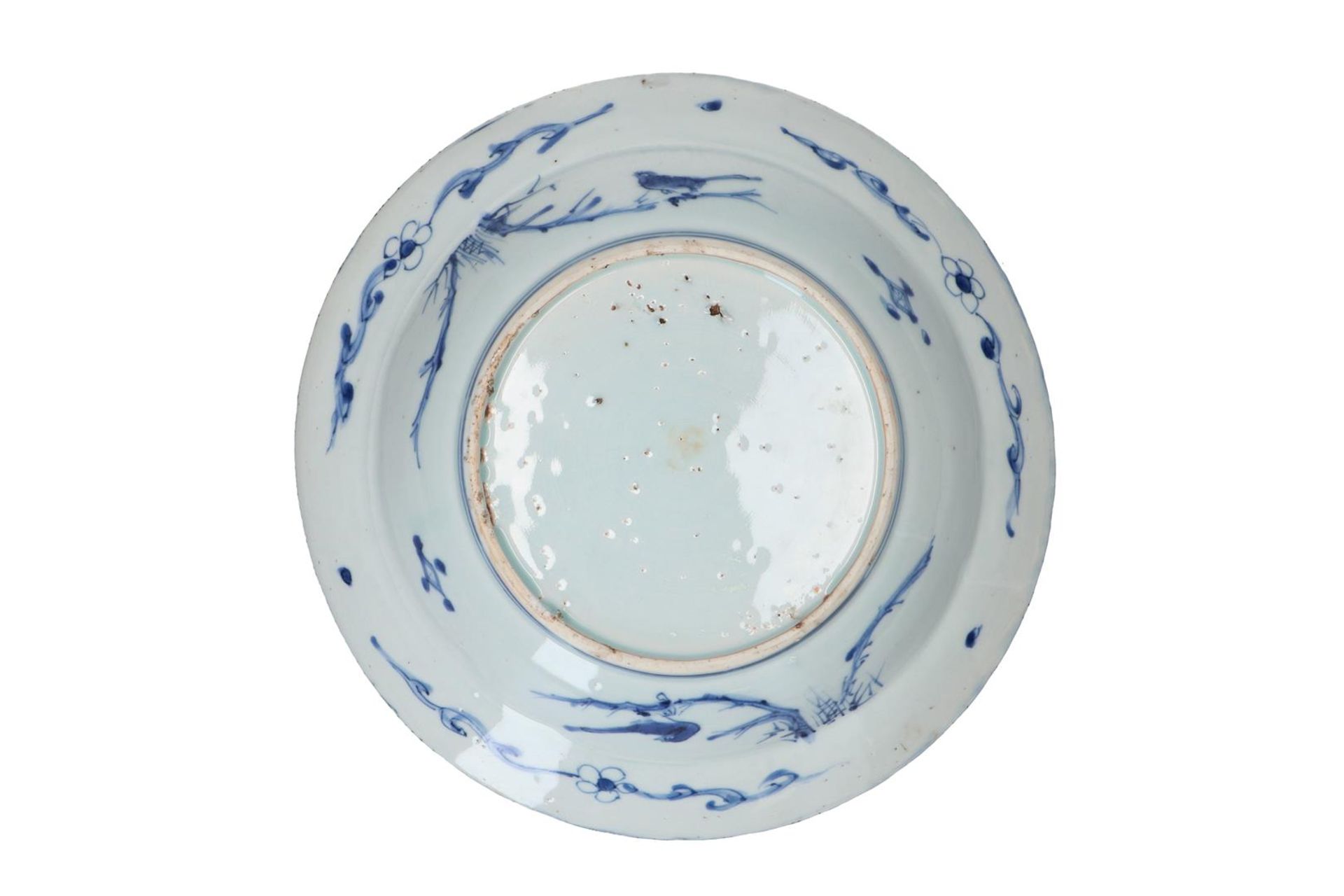 A blue and white 'kraak' porcelain deep dish, decorated with flowers, fruits and birds. Unmarked. - Image 2 of 2