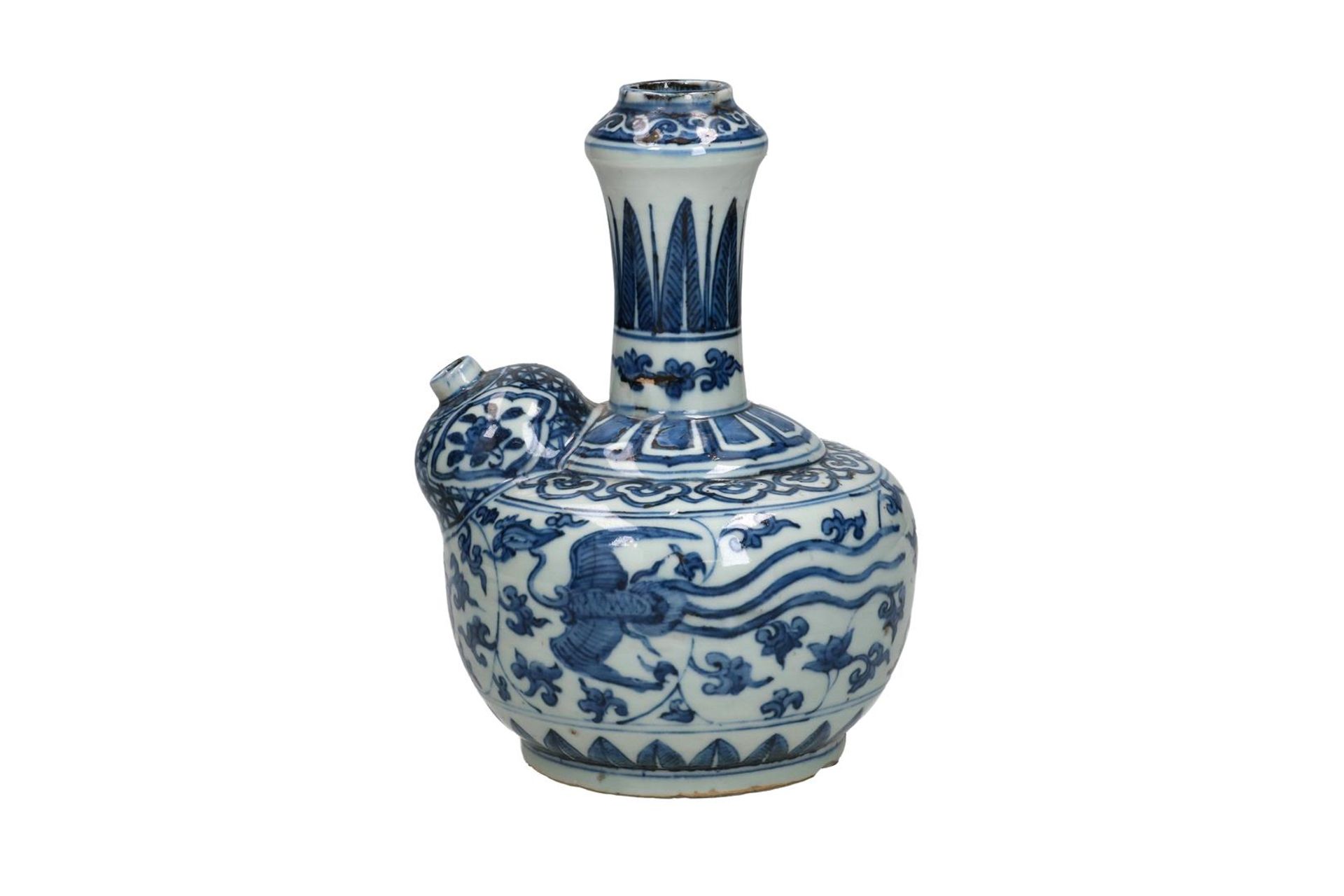 A blue and white porcelain kendi with a geometric decoration of leaves and a phoenix on the belly.