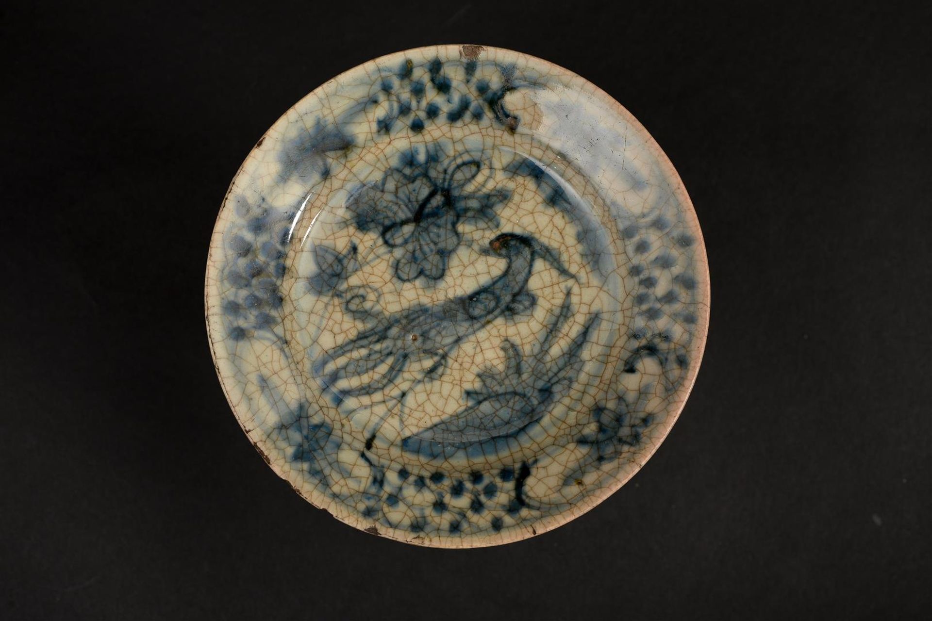 A set of four blue and white Swatow dishes, one decorated with two dragons chasing a flaming pearl - Image 2 of 11