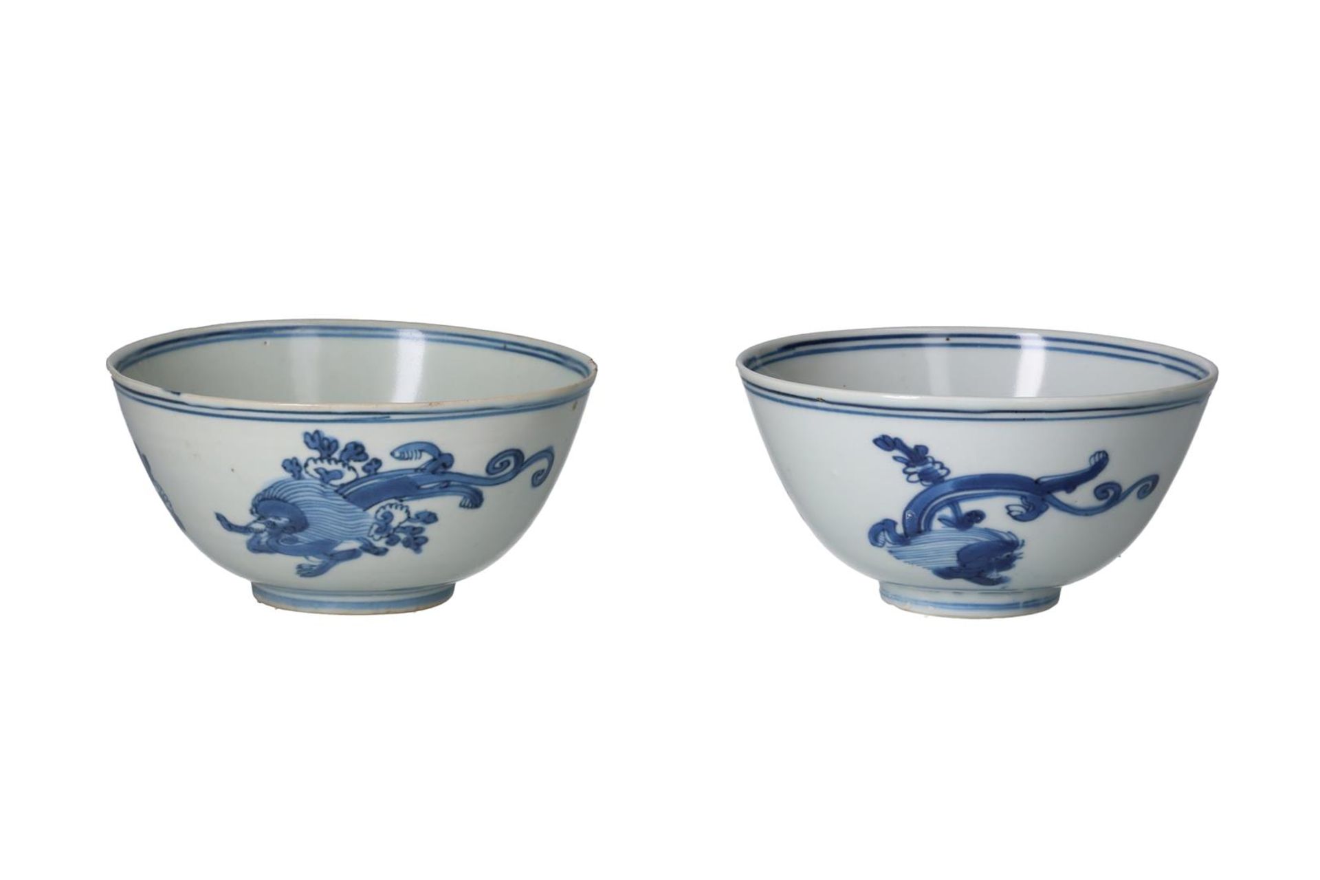 A near pair of blue and white porcelain bowl, decorated with Kui dragons. One marked with 6-