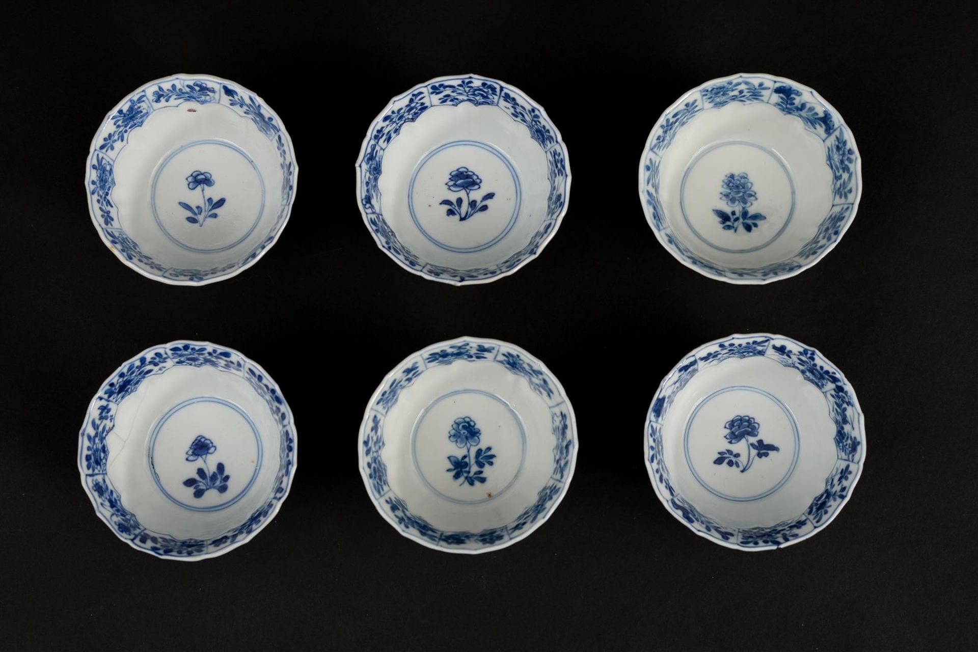 A set of six blue and white porcelain cups and saucers with a decoration of lotus in relief and a - Image 6 of 8