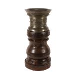 A large bronze mortar on a stained wood pedestal by Johannes van Halle and Pauwels Neerincx,