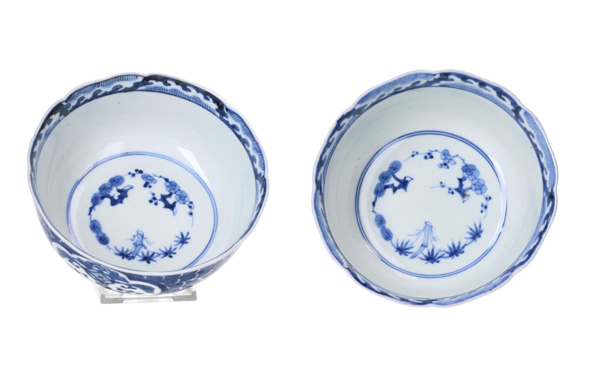 A pair of blue and white porcelain bowls, decorated with flowers. Marked with 4-character mark. - Image 6 of 7