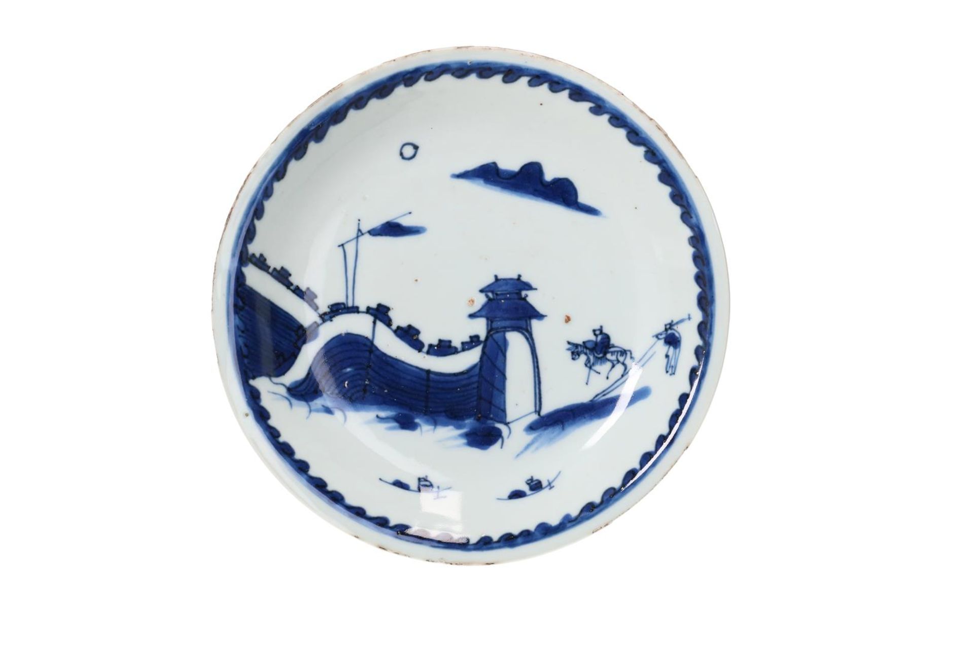 A pair of blue and white porcelain saucers, decorated with two figures on horseback approaching a - Image 2 of 5