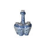 A blue and white porcelain tulip vase, decorated with flowers, birds and bamboo. Unmarked. China,