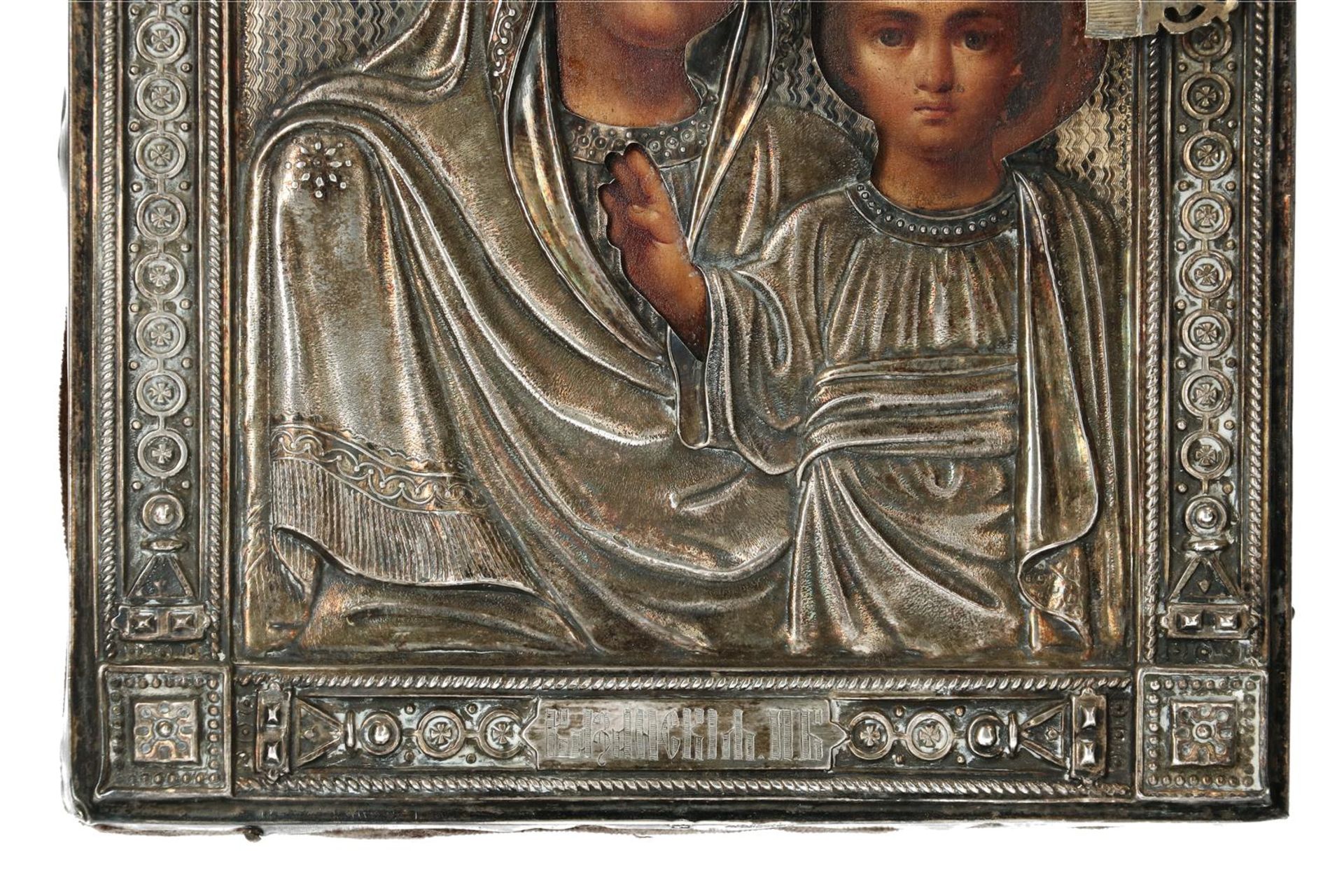 A wooden icon with silver riza, depicting 'Mary with child'. Russia, around 1900. H. 18 cm. W. 14. - Image 5 of 5